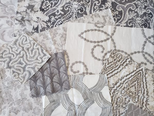 Gray fabric samples with various patterns