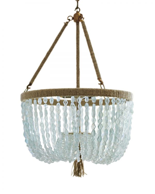 Cut seaglass beads and a hemp-wrapped frame make the Seychelles chandelier by Serena and Lily the perfect coastal accent.