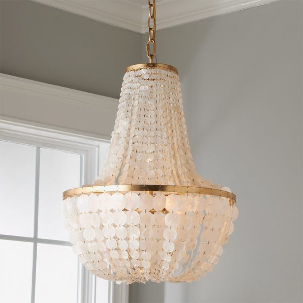 The Capiz Shell chandelier from Shades of light comes in 2 different finishes to help you get an elegant coastal look in your home.