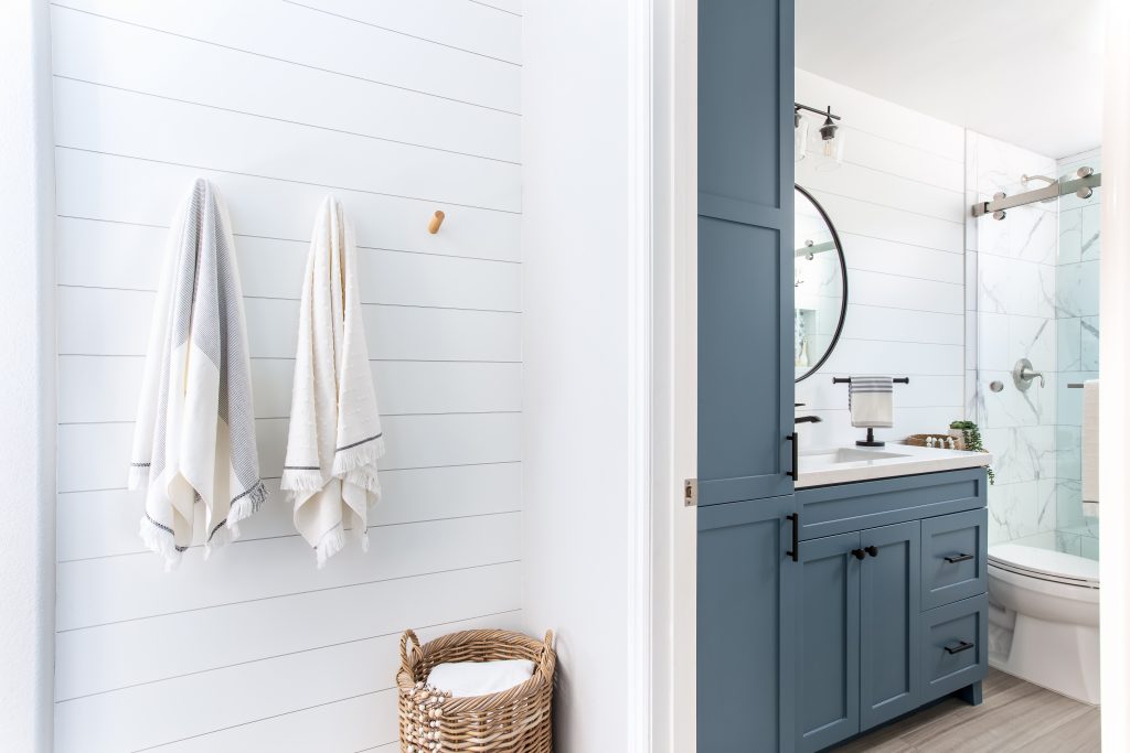 Modern farmhouse meets coastal style bathroom remodel